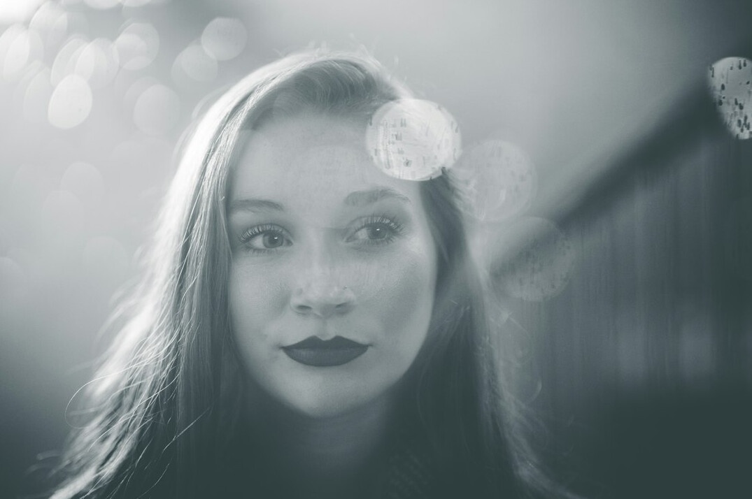 Portrait of a young woman with a gentle smile