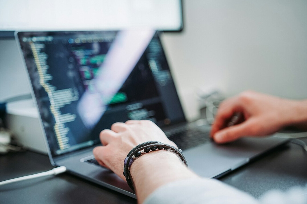beginner programmer learning code on laptop
