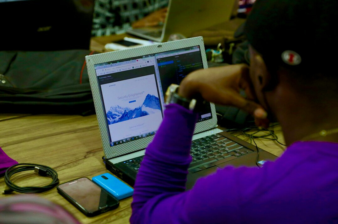 student practicing coding exercises